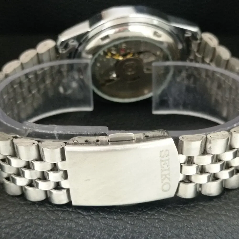Vintage 1990 Seiko Automatic Mens Silver Watch W/daydate & White accents